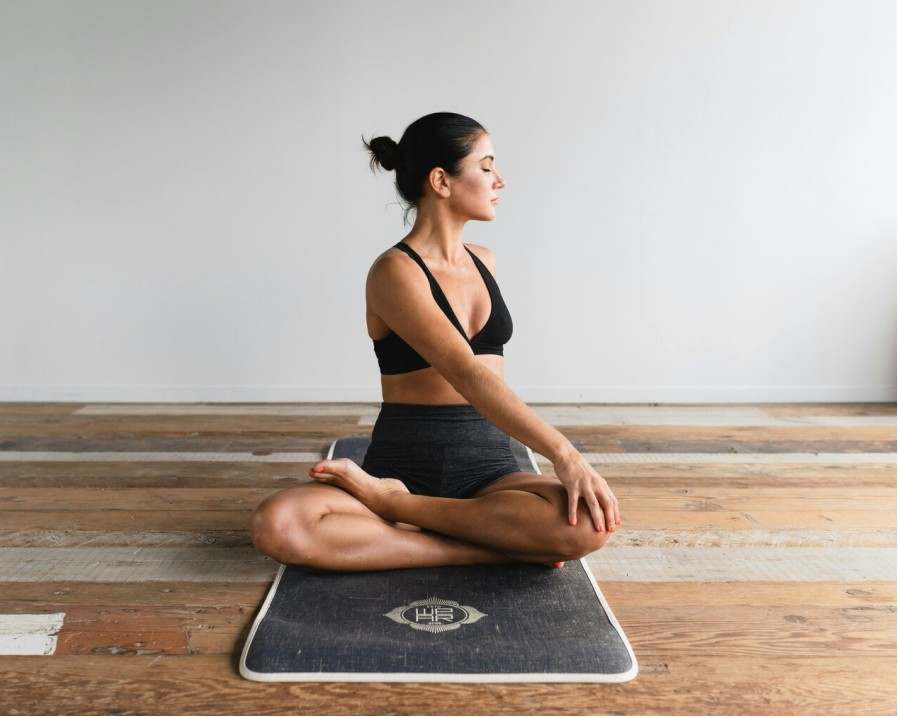 Students in a flowing yoga class