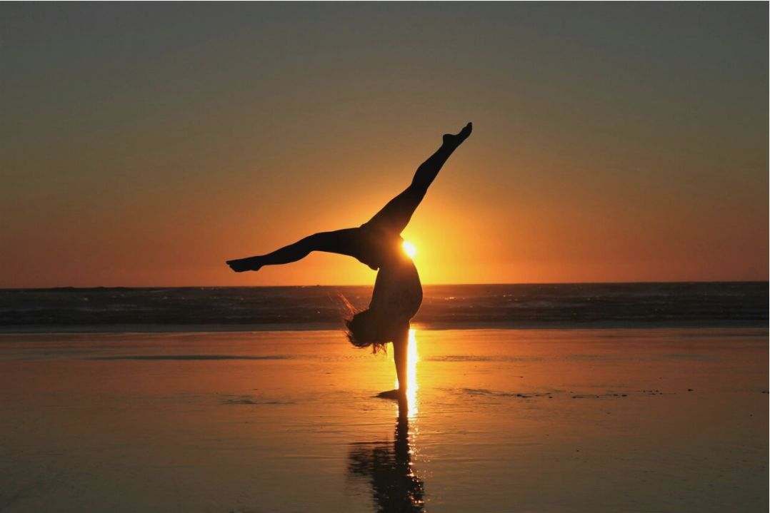 Instructor demonstrating stretch